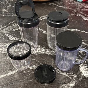 Magic Bullet cups with various lids
